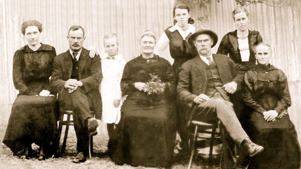 The Luddington family gathered for a formal portrait